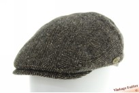 Platte pet Fiebig bruin zwart visgraat met oorwarm...