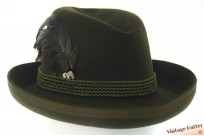Hunting hat dark green brushed felt woth upwards brim and feathers 56