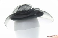 Disc Fascinator black polyester with hairbun-elastic 